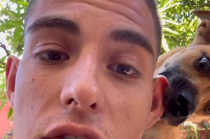 Jovem tenta gravar reflexão e é ‘interrompido’ por cãozinho: ‘é uma dificuldade’, brinca